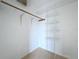Well-organized closet with wire shelving and a hanging rod at 9606 Chandon Dr, Orlando, FL 32825
