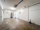 Attached garage with ample space for storage and a water heater at 9606 Chandon Dr, Orlando, FL 32825