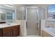 Close up of a bathroom with a shower and a vanity at 10097 Leland Dr, Orlando, FL 32827