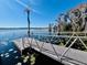 Aluminum floating dock on calm lake water at 10097 Leland Dr, Orlando, FL 32827