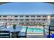 Private balcony overlooking the pool and community at 111 N Atlantic Ave # 2090, New Smyrna Beach, FL 32169