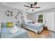 Guest bedroom with twin beds and coastal decor at 111 N Atlantic Ave # 2090, New Smyrna Beach, FL 32169