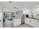 Modern kitchen with granite countertops and stainless steel appliances at 111 N Atlantic Ave # 2090, New Smyrna Beach, FL 32169