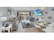 Spacious living area with comfortable seating and dining table at 111 N Atlantic Ave # 2090, New Smyrna Beach, FL 32169
