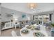 Relaxing living room with comfortable seating and access to balcony at 111 N Atlantic Ave # 2090, New Smyrna Beach, FL 32169