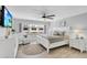 Relaxing main bedroom with king-size bed and plenty of natural light at 111 N Atlantic Ave # 2090, New Smyrna Beach, FL 32169