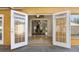 French doors open to the backyard patio at 11944 Cheltinham Dr, Orlando, FL 32824
