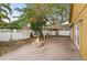 Backyard patio with fire pit and pergola at 11944 Cheltinham Dr, Orlando, FL 32824