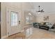 Bright entryway with tiled floor and access to living room at 11944 Cheltinham Dr, Orlando, FL 32824