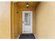 Front entryway with white door and storm door at 11944 Cheltinham Dr, Orlando, FL 32824