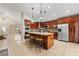Gourmet kitchen boasting granite countertops and stainless steel appliances at 11944 Cheltinham Dr, Orlando, FL 32824
