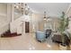 Spacious living room with high ceilings,tile floors, and ample natural light at 11944 Cheltinham Dr, Orlando, FL 32824