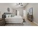 King sized bedroom with ensuite bath and walk-in closet at 11944 Cheltinham Dr, Orlando, FL 32824