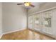 Home office with French doors leading to the backyard at 11944 Cheltinham Dr, Orlando, FL 32824