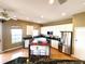 Modern kitchen with stainless steel appliances and granite countertops at 13328 Lake Turnberry Cir, Orlando, FL 32828