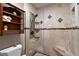Elegant bathroom with a large walk-in shower and built-in shelving at 1339 Villa Ln # 50, Apopka, FL 32712