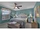 Primary bedroom with a calming blue color scheme and ample space at 1339 Villa Ln # 50, Apopka, FL 32712