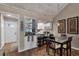 Dining area with built-in bar and wood floors at 1339 Villa Ln # 50, Apopka, FL 32712