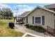 Exterior view of tan house with walkway at 1339 Villa Ln # 50, Apopka, FL 32712