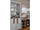 Kitchen features granite countertops and white cabinets at 1339 Villa Ln # 50, Apopka, FL 32712