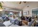Comfortable living room with vaulted ceiling, hardwood floors, and view to bedroom and porch at 1339 Villa Ln # 50, Apopka, FL 32712