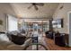 Spacious living room with vaulted ceiling, hardwood floors, and access to a screened porch at 1339 Villa Ln # 50, Apopka, FL 32712