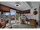 Bright sunroom with wicker furniture and view of patio at 1339 Villa Ln # 50, Apopka, FL 32712