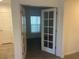 Bright office space with white doors and window blinds at 1409 Sawgrass Hammock Ln, Davenport, FL 33837