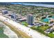 Wide aerial showcasing the building's beachfront location at 1420 N Atlantic Ave # 1501, Daytona Beach, FL 32118