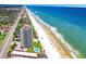 Aerial view of beachfront property, highlighting its coastal setting at 1420 N Atlantic Ave # 1501, Daytona Beach, FL 32118