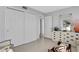 Bedroom with double closets and dresser at 1420 N Atlantic Ave # 1501, Daytona Beach, FL 32118