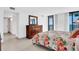 Bedroom with dresser and access to hallway at 1420 N Atlantic Ave # 1501, Daytona Beach, FL 32118