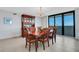 Dining room with wooden table and chairs, ocean view at 1420 N Atlantic Ave # 1501, Daytona Beach, FL 32118