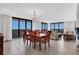 Elegant dining room with ocean view and a chandelier at 1420 N Atlantic Ave # 1501, Daytona Beach, FL 32118