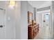 Entryway with wood dresser and access to living area at 1420 N Atlantic Ave # 1501, Daytona Beach, FL 32118