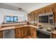 Kitchen features wood cabinets and ocean view at 1420 N Atlantic Ave # 1501, Daytona Beach, FL 32118