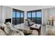 Spacious living room with ocean views and comfortable sofas at 1420 N Atlantic Ave # 1501, Daytona Beach, FL 32118