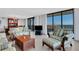 Living room with ocean view and comfortable sofas at 1420 N Atlantic Ave # 1501, Daytona Beach, FL 32118