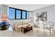 Living room with ocean view and comfortable seating at 1420 N Atlantic Ave # 1501, Daytona Beach, FL 32118