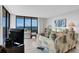 Living room with ocean view and comfortable seating at 1420 N Atlantic Ave # 1501, Daytona Beach, FL 32118