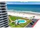 Oceanfront pool with ample lounge chairs at 1420 N Atlantic Ave # 1501, Daytona Beach, FL 32118