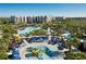 Aerial view of resort community with expansive pool and water features at 14501 Grove Resort Ave # 3135, Winter Garden, FL 34787