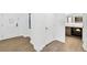 Bright hallway with access to bathroom and bedrooms at 14501 Grove Resort Ave # 3135, Winter Garden, FL 34787
