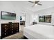 Main bedroom with large bed, dresser and view to other rooms at 14501 Grove Resort Ave # 3135, Winter Garden, FL 34787