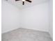 Empty bedroom featuring tile floors and a ceiling fan at 15 Dogwood Drive Crse, Ocala, FL 34472