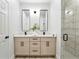 Modern bathroom with double vanity and walk-in shower at 1608 Airmont Ave, Deltona, FL 32725