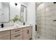 Elegant bathroom, featuring a double vanity and a large walk-in shower at 1608 Airmont Ave, Deltona, FL 32725