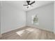 Bright bedroom with ceiling fan and laminate flooring at 1608 Airmont Ave, Deltona, FL 32725