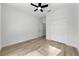 Spacious bedroom featuring a large closet and wood-look floors at 1608 Airmont Ave, Deltona, FL 32725