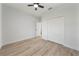 Simple bedroom with ample closet space and wood flooring at 1608 Airmont Ave, Deltona, FL 32725